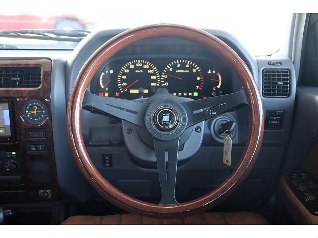 ランドクルーザープラド ＴＸリミテッド　ＡＲＭＹ　後期型　ルーフレール付　Ｎｅｗグレーペイント　新品ジオランダーＸ－ＡＴ２３５タイヤ　新品内張張替施工　新品クラシックレザー調シートカバー　新品カロッツェリア製ＳＤナビＴＶ　新品バックカメラ（13枚目）