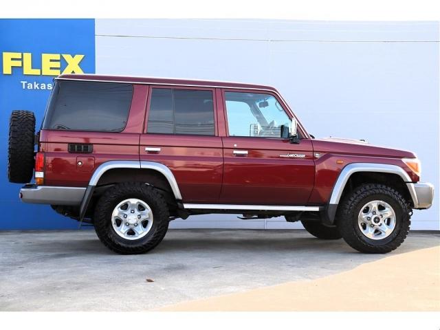ランドクルーザー７０ ４．０　４ＷＤ　純正メーカーＯＰデフロック　純正メーカーＯＰ電動ウインチ　純正ＯＰフォグランプ　再販モデルランクル７０　ワインレッドボディ　５速ＭＴ車　純正１６インチＡＷ　純正ナビ　ＥＴＣ車載器　フロアマット（4枚目）