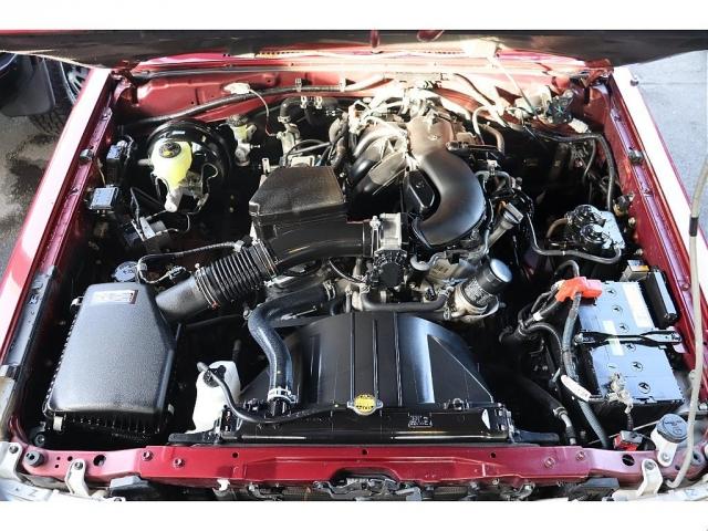 ランドクルーザー７０ ４．０　４ＷＤ　純正メーカーＯＰデフロック　純正メーカーＯＰ電動ウインチ　純正ＯＰフォグランプ　再販モデルランクル７０　ワインレッドボディ　５速ＭＴ車　純正１６インチＡＷ　純正ナビ　ＥＴＣ車載器　フロアマット（10枚目）