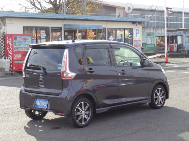 ｅＫカスタム Ｔセーフティパッケージ　雹凹有　ＦＣＭ　フルセグＳＤナビ　アラウンドビューモニター　ＨＩＤヘッドライト　クルーズコントロール　ＥＴＣ　シートヒーター　コーナーセンサー　キープッシュスタート　リアダークガラス　純正アルミ（58枚目）