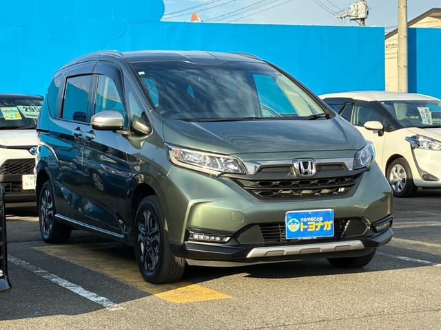 フリードハイブリッド ハイブリッド・クロスター 4WD 純正インターナビ バックカメラ 両側パワースライドドア アクティブコーナーライト 前後ドラレコ ビルトインETC ヒーター付きコンビシート LEDオートライト 雹凹(4枚目)