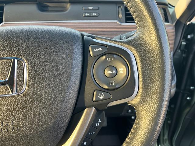 フリードハイブリッド ハイブリッド・クロスター 4WD 純正インターナビ バックカメラ 両側パワースライドドア アクティブコーナーライト 前後ドラレコ ビルトインETC ヒーター付きコンビシート LEDオートライト 雹凹(24枚目)