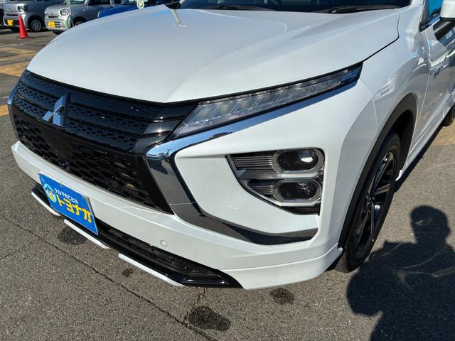 エクリプスクロスＰＨＥＶ Ｐ　４ＷＤ　ルーフレール　スマートフォン連携ナビ　フルセグＴＶ　マルチアラウンドモニター　マイパイロット　ＬＥＤ　Ｐシート　前席後席シートヒーター　ステアリングヒーター　　パワーバックドア　雹凹（65枚目）