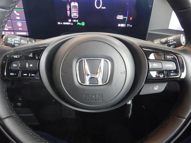 Ｈｏｎｄａ ｅ アドバンス　ホンダセンシング　ナビＴＶ　ＥＴＣ　マルチビューモニター　デジタルインナーミラー　シートヒーター　アダプティブクルーズコントロール　Ｂｌｕｅｔｏｏｔｈ　前後ドラレコ　ステアリングヒーター（67枚目）