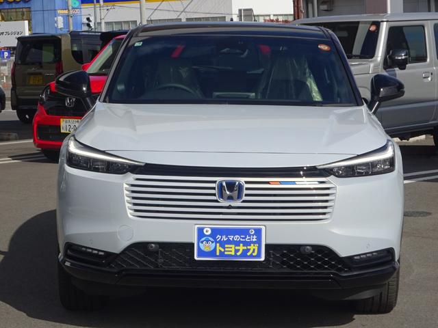 ヴェゼル e:HEV Z・PLaYパッケージ 地デジフルセグTV ホンダ純正9インチナビゲーション マルチビューモニター ETC2.0 プレミアムオーディオ パノラマガラスルーフ 4WD 後退出庫サポート パワーバックドア 登録済未使用車(2枚目)