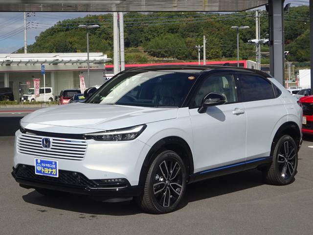 ヴェゼル e:HEV Z・PLaYパッケージ 地デジフルセグTV ホンダ純正9インチナビゲーション マルチビューモニター ETC2.0 プレミアムオーディオ パノラマガラスルーフ 4WD 後退出庫サポート パワーバックドア 登録済未使用車(4枚目)