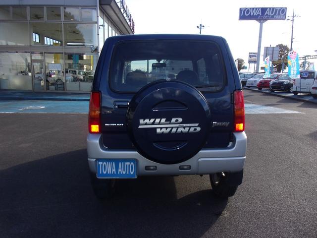 ジムニー ワイルドウインド 80周年記念車 マニュアル パートタイム4WD高低二段切替式(後輪駆動ベース) フォグランプ ジオランダー CD/MD キーレス(3枚目)