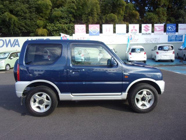 ジムニー ワイルドウインド 80周年記念車 マニュアル パートタイム4WD高低二段切替式(後輪駆動ベース) フォグランプ ジオランダー CD/MD キーレス(4枚目)