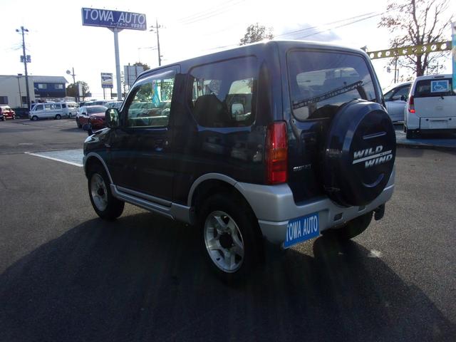 ジムニー ワイルドウインド 80周年記念車 マニュアル パートタイム4WD高低二段切替式(後輪駆動ベース) フォグランプ ジオランダー CD/MD キーレス(9枚目)