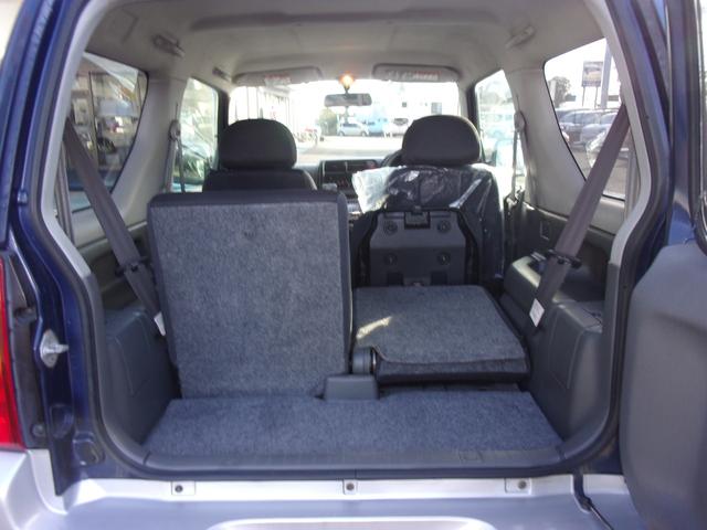 ジムニー ワイルドウインド 80周年記念車 マニュアル パートタイム4WD高低二段切替式(後輪駆動ベース) フォグランプ ジオランダー CD/MD キーレス(11枚目)