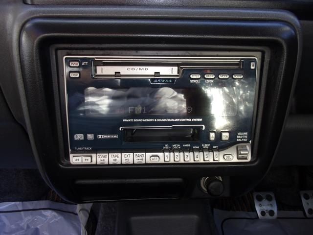 ジムニー ワイルドウインド 80周年記念車 マニュアル パートタイム4WD高低二段切替式(後輪駆動ベース) フォグランプ ジオランダー CD/MD キーレス(20枚目)