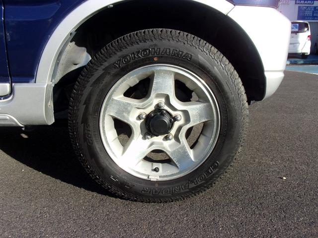 ジムニー ワイルドウインド 80周年記念車 マニュアル パートタイム4WD高低二段切替式(後輪駆動ベース) フォグランプ ジオランダー CD/MD キーレス(27枚目)