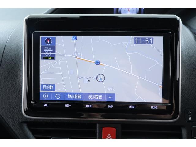 ヴォクシー ＺＳ　衝突被害軽減ブレーキ　純正９インチナビ　地デジＴＶ　バックカメラ　スマートキー　ＥＴＣ　クルコン　オートハイビーム　車線逸脱警報　クリアランスソナー　ＬＥＤライト　先行車発進お知らせ機能　Ｂｌｕｅｔｏｏｔｈ接続　横滑り防止装置　純正アルミ　ワンオーナー（14枚目）