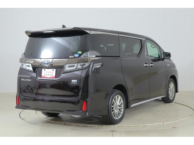 ヴェルファイアハイブリッド Ｚ　ゴールデンアイズ　４ＷＤ　衝突軽減ブレーキ　９型ＤＡナビ　地デジＴＶ　バックカメラ　後席モニター　ＥＴＣ２．０　レーダークルーズ　車線逸脱警報　クリアランスソナー　前後ドラレコ　両側電動ドア　ＡＣ１００Ｖ－１５００Ｗ　パワーバックドア　３眼ＬＥＤライト（50枚目）