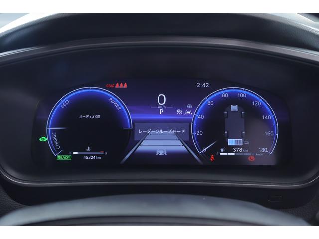 カローラツーリング ハイブリッド　ダブルバイビー　衝突被害軽減ブレーキ　ドラレコ　１０．５インチＤＡナビ　地デジＴＶ　バックカメラ　ＢＳＭ　レーダークルーズ　ＥＴＣ２．０　車線逸脱警報　クリアランスソナー　シートヒーター　ステアリングヒーター　ＡＣ１００Ｖ－１５００Ｗ　ワンオーナー（18枚目）