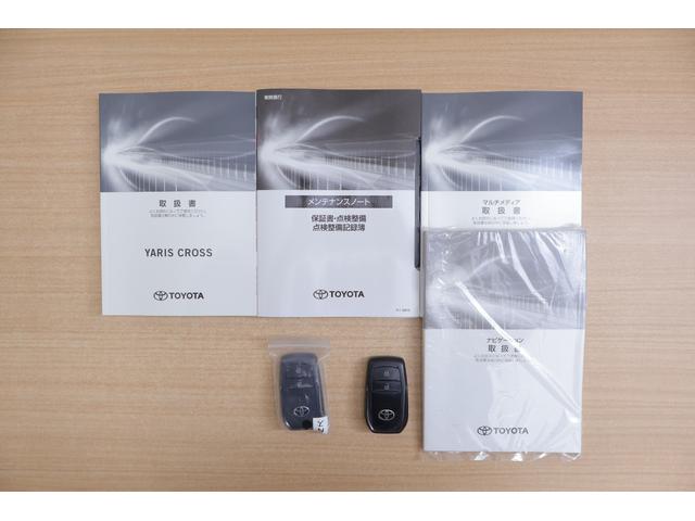 ヤリスクロス ハイブリッドＧ　衝突被害軽減ブレーキ　純正８インチＤＡナビ　全周囲カメラ　ＢＳＭ　スマートキー　ＥＴＣ２．０　レーダークルーズ　車線逸脱警報　オートハイビーム　クリアランスソナー　シートヒーター　ステアリングヒーター　ＬＥＤライト　横滑り防止装置　ワンオーナー（50枚目）