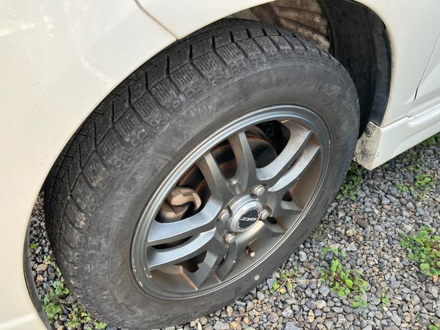 ゼストスパーク Ｗターボ　ＥＴＣ　ＣＤ　オートエアコン　アルミホイール　ＨＩＤ　スマートキー　スタイリッシュパッケージ　本革巻きステアリングホイール（62枚目）