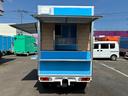 　ＮＴ１００クリッパー　移動販売車　キッチンカー　ＡＴ車　跳ね上げ扉　換気扇　販売窓２か所　ＬＥＤ照明　ドアストッパー　２層シンク１００Ｌタンク２個　排水小窓　コンセント（11枚目）