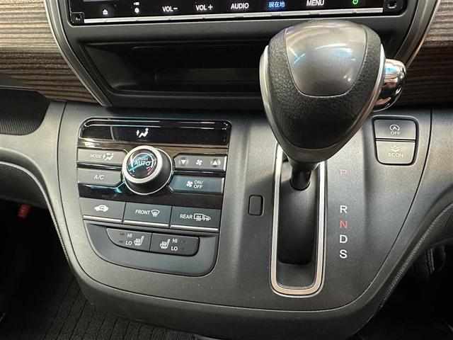 フリード＋ クロスター・ホンダセンシング　ＡＷ　衝突軽減Ｂ　地デジ　サイドエアバッグ　クルコン　ＤＶＤ　パワーウインドウ　リアカメラ　横滑り防止装置　リモコンキー　盗難防止装置　エコアイドル　ＥＴＣ車載器　オートエアコン　エアバッグ　ナビＴＶ（12枚目）