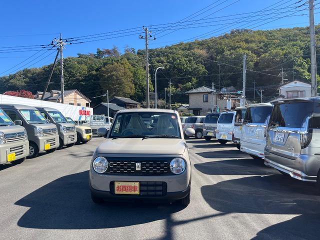 アルトラパン ハイブリッドG マイナー後モデル Bluetoothナビ付届出済み未使用車 スズキセーフティサポート シートヒーター メーカー保証付(2枚目)