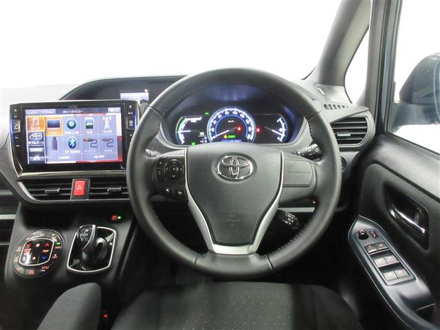 ヴォクシー ハイブリッドＶ　スマートキープッシュスタート　盗難防止アラーム　ウォークスルー　Ｂモニター　Ｗエアバック　ナビＴＶ　ＥＳＣ　ＥＴＣ車載器　リモコンキー　ＰＳ　ＬＥＤヘットライト　運転席エアバック　パワーウィンドウ（4枚目）