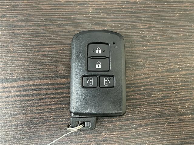 ヴォクシー ハイブリッドZS 煌III 地デジTV リヤカメラ Wエアコン スマートキー ミュージックプレイヤー接続可 DVD再生可 クルコン VSC キーレス アルミホイール ナビ&TV LEDヘッドランプ ETC 3列シート 記録簿(35枚目)