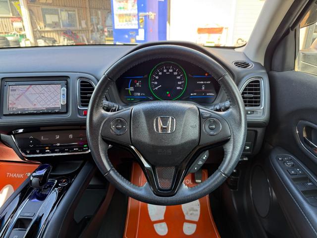 ヴェゼル ハイブリッドＸ　純正ＳＤナビ　バックカメラ　ステアリングリモコン　クルーズコントロール　パドルシフト　電動パーキングブレーキ　ＥＴＣ　シティブレーキアクティブシステム　ＬＥＤヘッドライト　オートライト（21枚目）