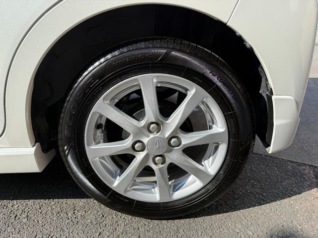 ムーヴ カスタム　Ｘ　ＳＡ　社外ポータブルナビ・ワンセグＴＶ　ＬＥＤヘッドライト　オートライト　ウインカーミラー　ベンチシート　エコアイドル　ドライブレコーダー　純正１４インチアルミホイール　純正エアロ　パーキングセンサー（15枚目）