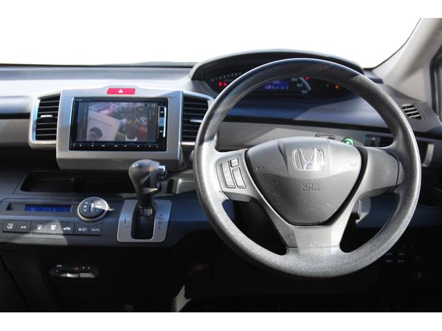 フリード G ジャストセレクション 純正メモリーナビ 後席モニター フルセグTV 両側パワースライドドア Bluetooth接続 バックカメラ 3列シート CD・DVD再生 オートライト 社外14インチAW(21枚目)