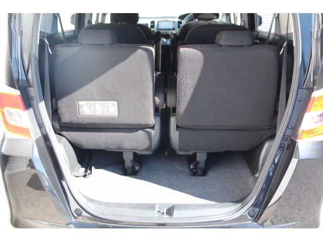 フリード G ジャストセレクション 純正メモリーナビ 後席モニター フルセグTV 両側パワースライドドア Bluetooth接続 バックカメラ 3列シート CD・DVD再生 オートライト 社外14インチAW(24枚目)