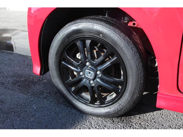 Ｎ－ＢＯＸカスタム ２トーンカラースタイル　Ｇ・Ａパッケージ　衝突被害軽減ブレーキ　純正ＨＤＤナビ　フルセグＴＶ　両側スライド片側電動ドア　スマートキー　ＨＩＤヘッドライト　純正アルミホイール（21枚目）