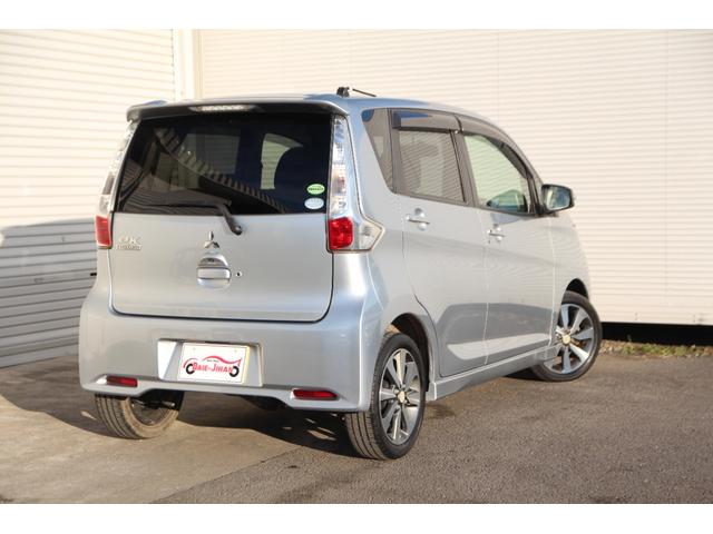 ｅＫカスタム Ｔ　４ＷＤ　ＣＤオーディオ　バックカメラ　スマートキー　シートヒーター　ＨＩＤヘッドライト　純正アルミホイール　電動格納ミラー（7枚目）