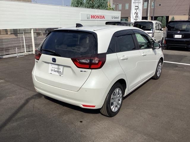 フィット e:HEVホーム 前後誤発進抑制機能 クリソナ 助手席エアバッグ 運転席エアバッグ シートヒーター アイドリングストップ LEDライト バックカメラ ABS サイドエアバッグ フルセグTV DVD再生(8枚目)