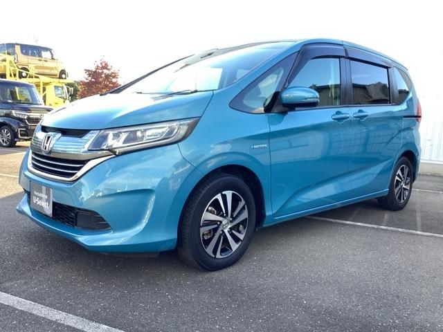 フリードハイブリッド ハイブリッド・EX 地デジフルセグTV シ-トヒ-タ- リヤカメラ LEDライト フルオートエアコン ABS DVD再生可 サイドエアバッグ キーフリー アイドリングストップ ナビ&TV 禁煙(3枚目)