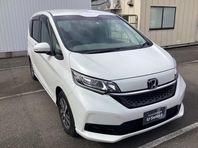 フリード+ G ワンオーナカー 衝突被害軽減システム ウォークスルー シ-トヒ-タ- 盗難防止装置 アイドリングストップ 両側パワースライドドア LEDヘッド Rカメ ESC エアバック ETC車載器 禁煙車(5枚目)