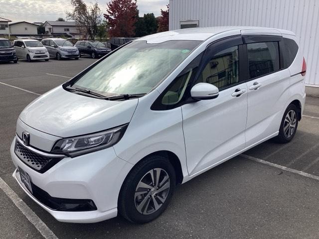 フリード+ G ワンオーナカー 衝突被害軽減システム ウォークスルー シ-トヒ-タ- 盗難防止装置 アイドリングストップ 両側パワースライドドア LEDヘッド Rカメ ESC エアバック ETC車載器 禁煙車(6枚目)