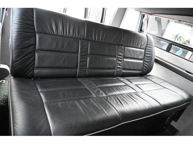 ダッジ・バン 　ラムバンミディアム　最終　５９００ｃｃ　リア観音　セカンドキャプテンシート　サードシート電動フルフラット　１６インチホイール　ヒッチメンバー　希少ＨＤクロームステップバンパー　オートチェックレポート（34枚目）