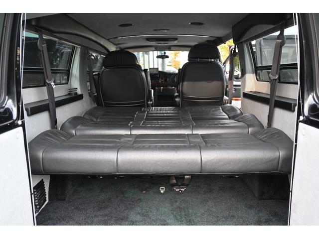 ダッジ・バン 　ラムバンミディアム　最終　５９００ｃｃ　リア観音　セカンドキャプテンシート　サードシート電動フルフラット　１６インチホイール　ヒッチメンバー　希少ＨＤクロームステップバンパー　オートチェックレポート（36枚目）