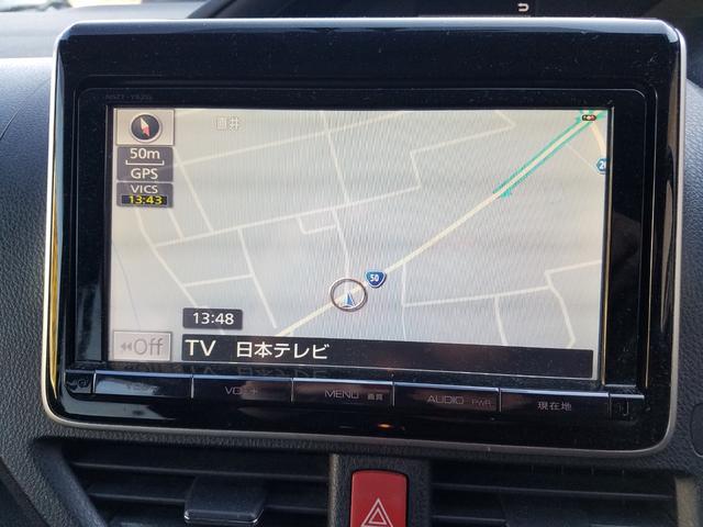 ヴォクシー ハイブリッドＶ　スマートキー・９インチナビ・フルセグＴＶ・走行中見れます・ブルートゥース・バックモニター・後席フリップダウンモニター・ＥＴＣ・ＴＲＤフルエアロ・ＦＯＧ・１５アルミ・両側パワースライドドア・車検９年６月（23枚目）