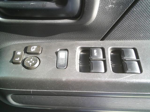 ワゴンＲ ハイブリッドＦＸ　４ＷＤ　社外メモリーナビＴＶ　バックカメラ　ＥＴＣ　シートヒーター　キーレースキー　オートエアコン　エコクール　１４インチアルミ　電動格納ドアミラー　セキュリティアラーム　スモークガラス（19枚目）