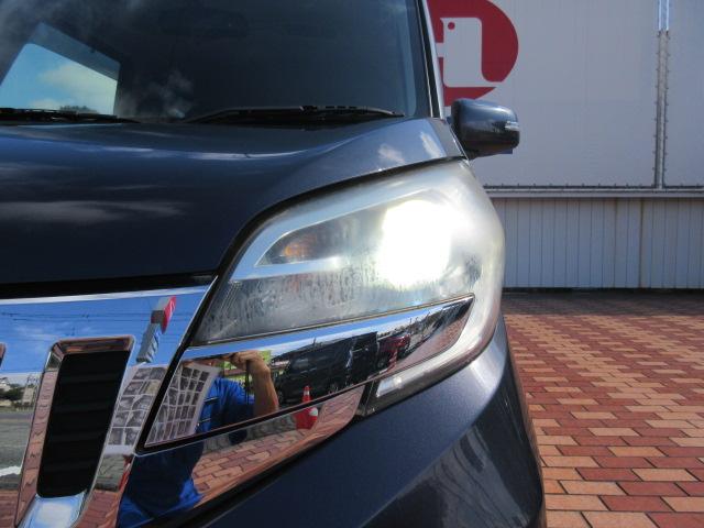 ｅＫスペースカスタム カスタムＴ　純正ナビ／Ｂカメラ／横滑防止／オート付ＨＩＤ＆フォグ／純１５ＡＷ／オート格納ミラー／ウィンカーミラー／インテリキー／プッシュスタート／革巻ステア／ＥＴＣ／ドアバイザー／（60枚目）