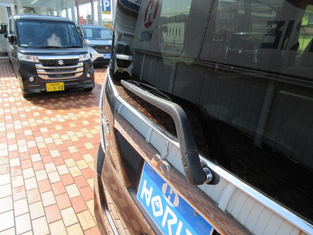 ｅＫスペースカスタム カスタムＴ　純正ナビ／Ｂカメラ／横滑防止／オート付ＨＩＤ＆フォグ／純１５ＡＷ／オート格納ミラー／ウィンカーミラー／インテリキー／プッシュスタート／革巻ステア／ＥＴＣ／ドアバイザー／（65枚目）
