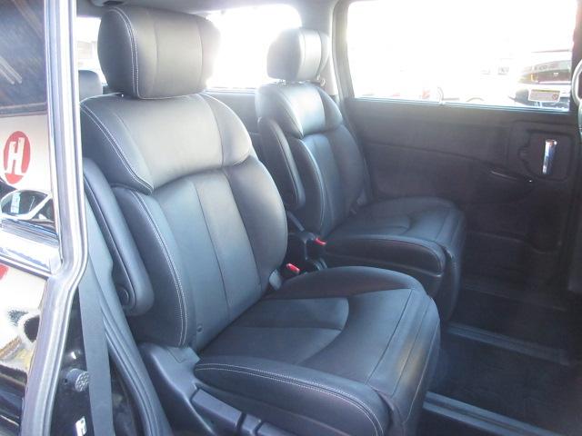 エルグランド ３５０ハイウェイスターアーバンクロムブラックレザー　純正ナビ　全周囲Ｍ　サンルーフ　フリップモニター　シートヒーター　オットマン　ＥＴＣ　コーナーセンサー　両側電動スライドドア　パワーバックドア　オート付ＨＩＤライト＆フォグ　オート格納ウィンカーミラー（54枚目）