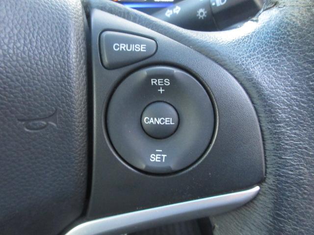 フィットハイブリッド Ｌパッケージ　社外ナビ　ＴＶ　バックカメラ　オートＬＥＤライト　衝突軽減ブレーキ　ハーフレザーシート　コーナーセンサ―　ＥＴＣ　クルーズコントロール　チップアップシート　スイッチ付革巻ステアリング（10枚目）