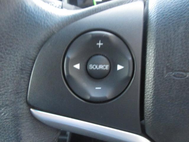 フィットハイブリッド Ｌパッケージ　社外ナビ　ＴＶ　バックカメラ　オートＬＥＤライト　衝突軽減ブレーキ　ハーフレザーシート　コーナーセンサ―　ＥＴＣ　クルーズコントロール　チップアップシート　スイッチ付革巻ステアリング（11枚目）