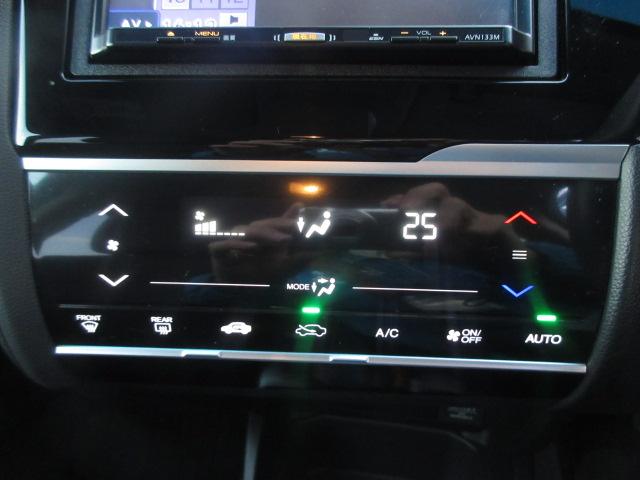 フィットハイブリッド Ｌパッケージ　社外ナビ　ＴＶ　バックカメラ　オートＬＥＤライト　衝突軽減ブレーキ　ハーフレザーシート　コーナーセンサ―　ＥＴＣ　クルーズコントロール　チップアップシート　スイッチ付革巻ステアリング（19枚目）