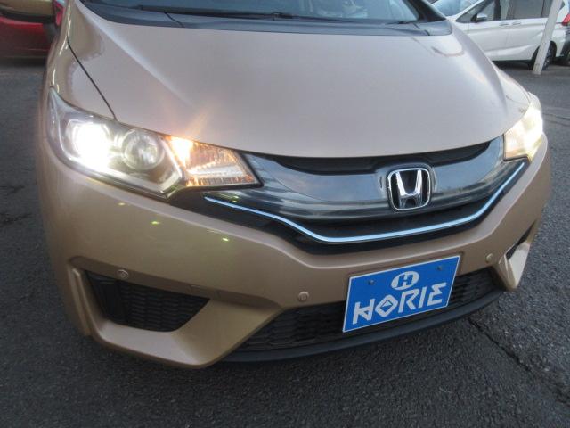 フィットハイブリッド Ｌパッケージ　社外ナビ　ＴＶ　バックカメラ　オートＬＥＤライト　衝突軽減ブレーキ　ハーフレザーシート　コーナーセンサ―　ＥＴＣ　クルーズコントロール　チップアップシート　スイッチ付革巻ステアリング（39枚目）