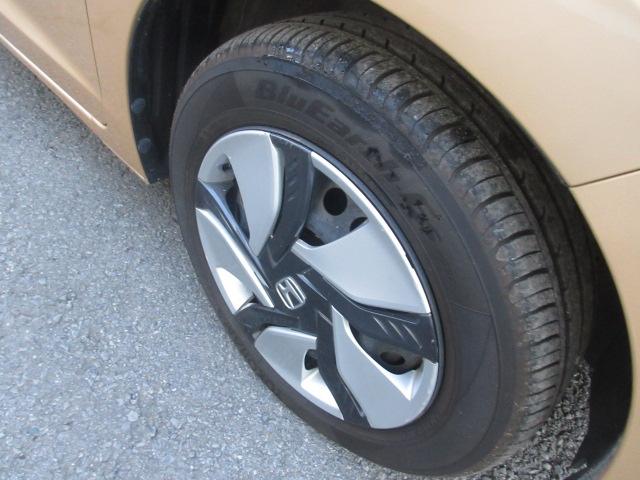 フィットハイブリッド Ｌパッケージ　社外ナビ　ＴＶ　バックカメラ　オートＬＥＤライト　衝突軽減ブレーキ　ハーフレザーシート　コーナーセンサ―　ＥＴＣ　クルーズコントロール　チップアップシート　スイッチ付革巻ステアリング（40枚目）