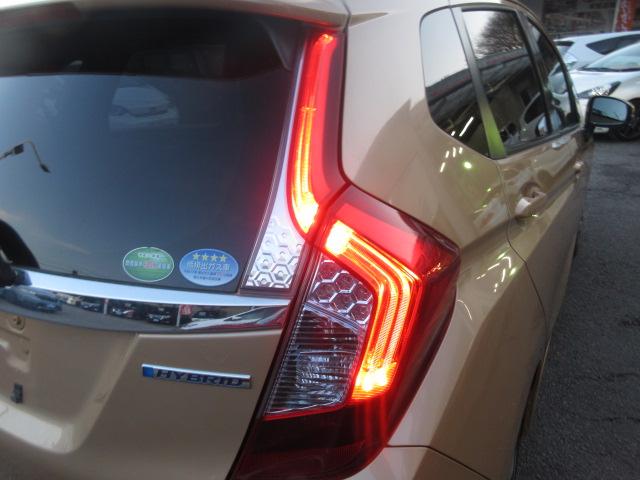 フィットハイブリッド Ｌパッケージ　社外ナビ　ＴＶ　バックカメラ　オートＬＥＤライト　衝突軽減ブレーキ　ハーフレザーシート　コーナーセンサ―　ＥＴＣ　クルーズコントロール　チップアップシート　スイッチ付革巻ステアリング（42枚目）