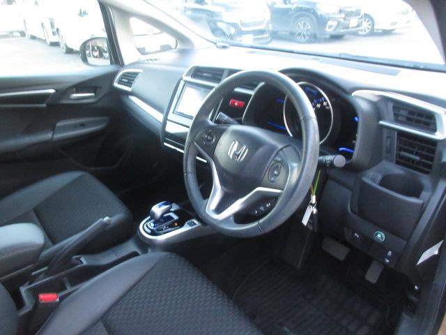 フィットハイブリッド Ｌパッケージ　社外ナビ　ＴＶ　バックカメラ　オートＬＥＤライト　衝突軽減ブレーキ　ハーフレザーシート　コーナーセンサ―　ＥＴＣ　クルーズコントロール　チップアップシート　スイッチ付革巻ステアリング（49枚目）